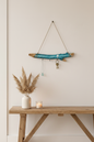 Driftwood Sailboat Hanger – Living Room Evening Scene