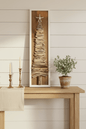 Driftwood  tree sign with starfish topper displayed in a cozy cottage setting
