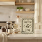 Coffee and Tea sage green wood counter sign styled on kitchen counter with French press ceramic mugs and tea tin
