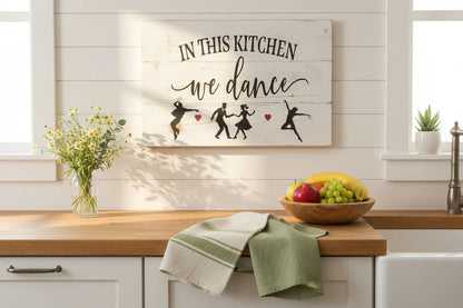 In This Kitchen We Dance sign styled in bright farmhouse kitchen with wildflowers and linen towels